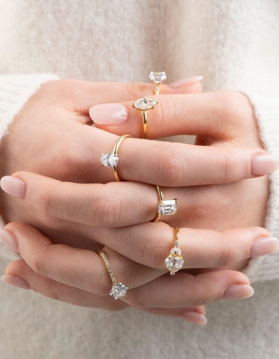 Andrew Mazzone Design Jewellers diamond engagement rings on both hands